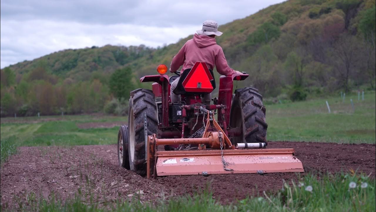 [4k] International Harvester doing work with the rototiller for our