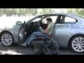 Quadriplegic transfers in and out of two-door BMW with TiLite ZR