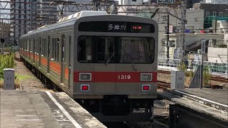 東急1000系1019編成が発車するシーン