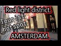 The Wallen "Red Light District".  DOWN TOWN AMSTERDAM.  Tourist area. Bike cam.  Hotspot Travel.