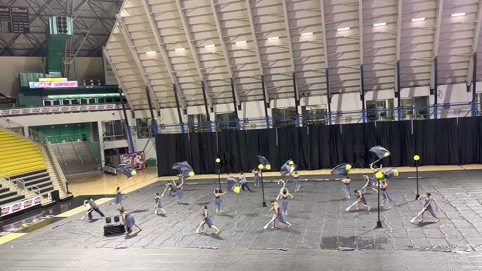 Color guard adds 'visual attribute' to marching band – The Red Ledger