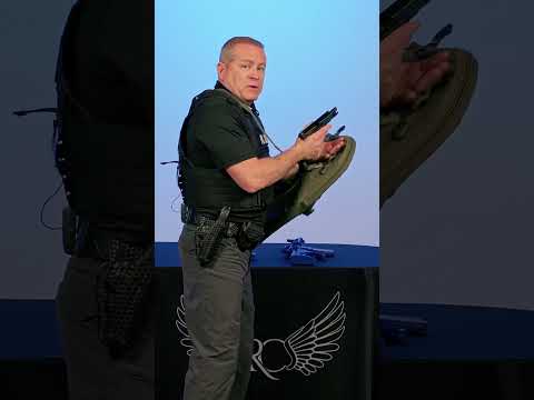 COMPACT RESPONSE SHIELD | Reloading a handgun while operating a ballistic shield.