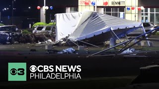 Crews begin cleanup after fatal crash damages car dealership in Allentown, Pennsylvania