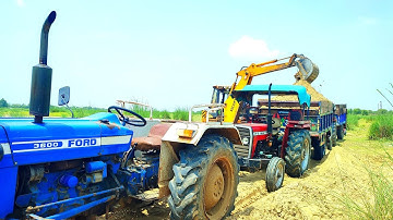 JCB 3dx Machine Loading Mud Together Eicher 380 and Massey Ferguson 241 with Jcb 3dx