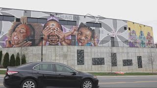 The artist of many murals around Charlotte tells us the meaning behind them