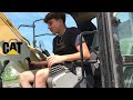 17 year old brother operating cat excavator