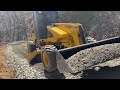 Mauldin m415xt pushing stone uphill on a 20 grade