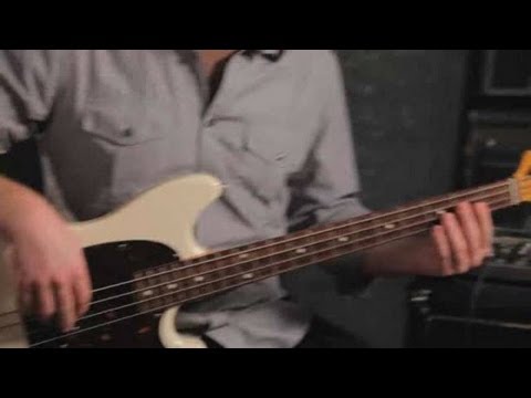 Come tenere chitarra, mentre seduto | Basso