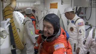 STS-130 Crew Strap In for Launch