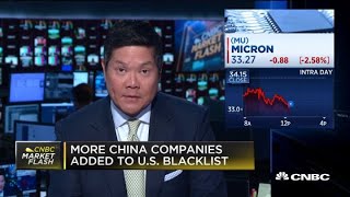 Chip stocks fall after more China companies added to US blacklist