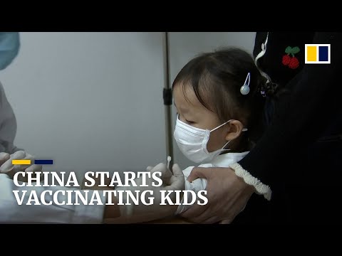 China starts vaccinating children over age 3 as outbreaks trigger more Covid-19 restrictions