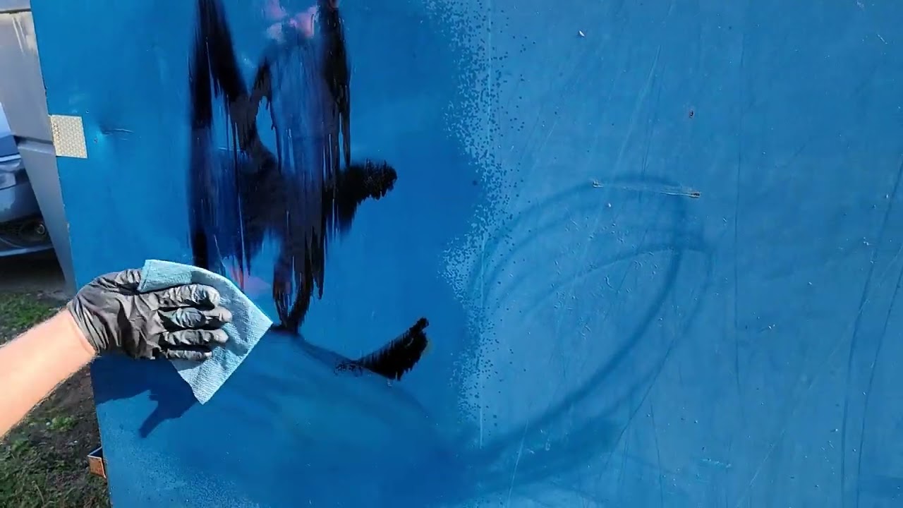 Graffiti Spray Paint removed from oxidized metal surface with Tagaway