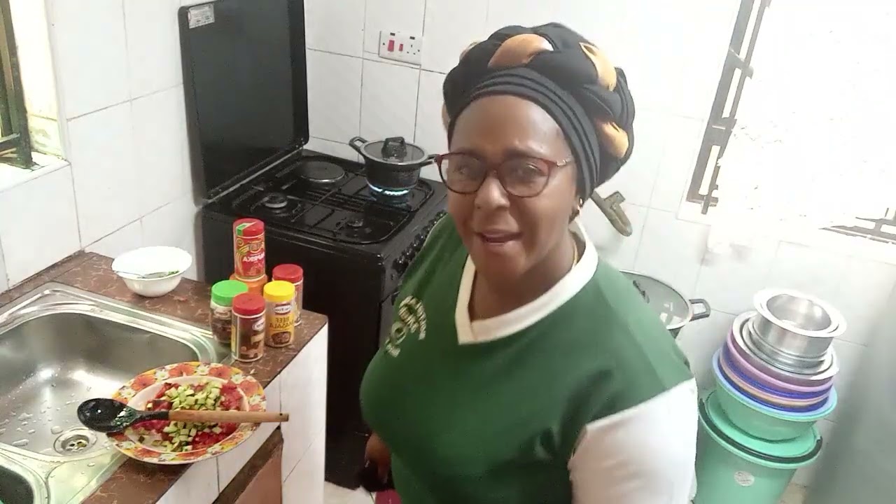 Making wet fry and Ugali. 