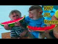 Sam boy & Asher Jr enjoying watermelon in his own way
