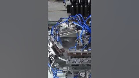 Multiple spot welding machine with rotating table