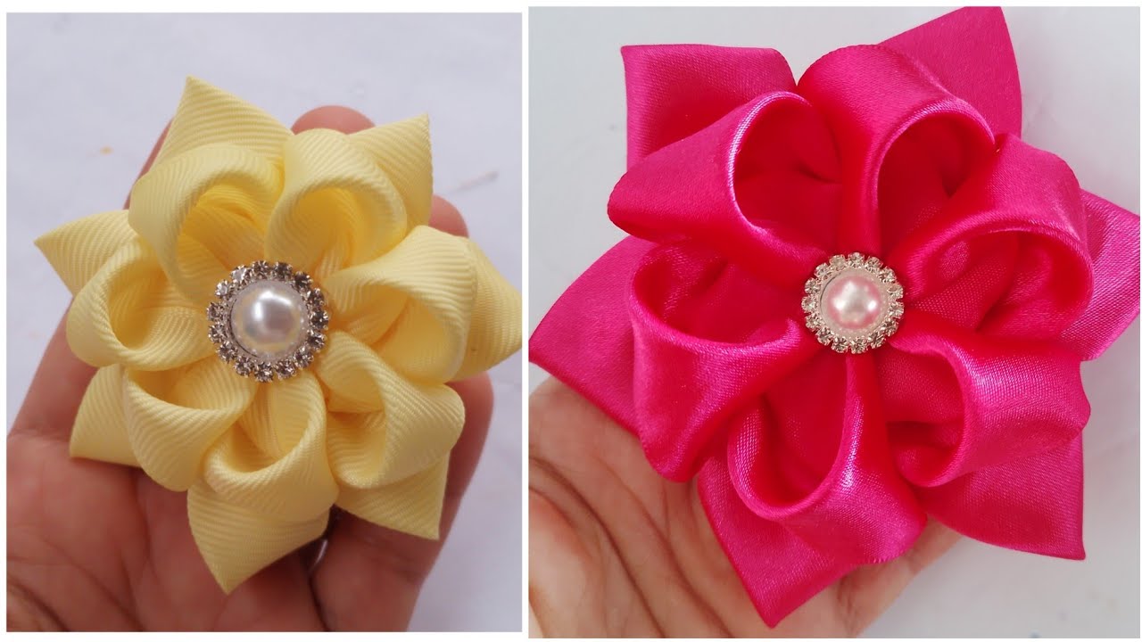 fiz com a fita n 9 e de cetim, flor de fita super fácil e muito linda.