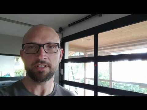 River House Remodel - Glass Garage Door in the Kitchen