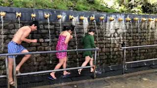 Devotees taking shower in Muktinath