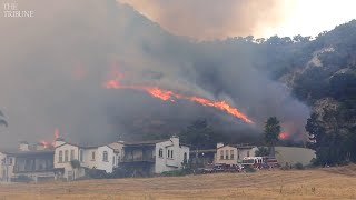 A vegetation fire closed highway 101 in shell beach, california, near
spyglass drive on june 15, 2020, threatening homes and leading to
evacuations. the blaz...