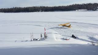 Glasair Sportsman on skis taking off