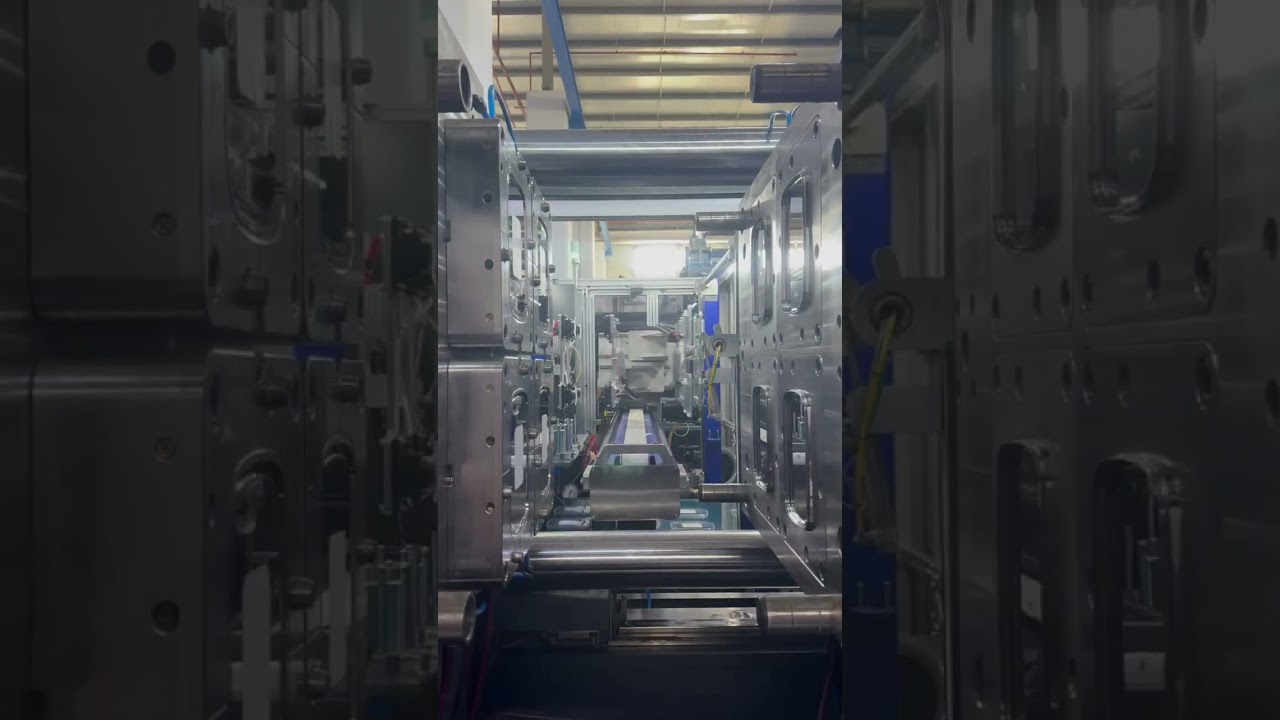 4 Cavity Lid IML Robot by Axcela IML & Automation