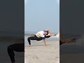 “Just another day but in a yoga pose 🧘♀️Would you try this? Yes or No. #flexibility#kozhikodebeach