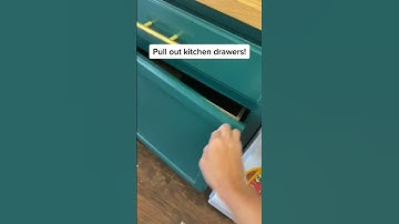 Kitchen cabinet with soft-close drawers