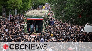 Thousands crowd streets for funeral procession of Iranian President Raisi