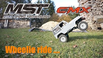 MST CMX with Jeep Wrangler -- Wheely content - can he make it?