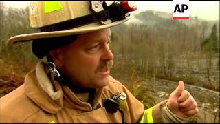 Crews searching for victims in the tangled debris field from the Washington mudslide halted their wo