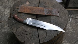 Making a Bowie knife from a semi truck leaf spring.