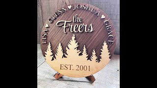 Wooden Dual Layer Family Sign custom engraved and cut from two layers of wood.