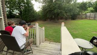backyard plinking, father and son