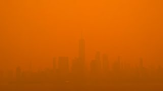 New York City skyline covered in orange haze as Canada fires burn