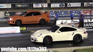 Porsche 911 Turbo vs Subaru STI Drag Race