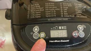 Using buttons on hamilton  beach artisan  bread maker