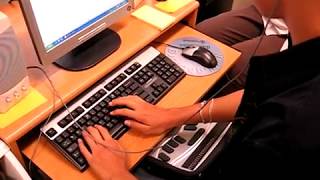Deaf-Blind student learns Braille Note, computer with Braille display, amplification for hearing