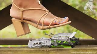 Pretty Merciless Feet crush a toy truck