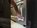 Removing Sticker from New Refrigerator 1