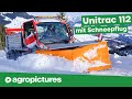 Schnee räumen mit Seitenschneepflug am Lindner Unitrac 112 LDrive | Traktortechnik im Winterdienst