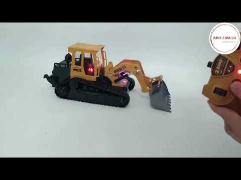 Бульдозер игрушечный трактор погрузчик на пульте ребёнку для игр в стройку / Гусеничная техника Свет звук 3.7V, видео 1