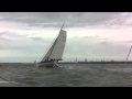Trimaran Dragonfly 32 overtaking a fast 50
