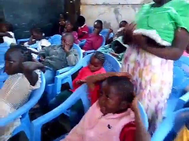GMFC Kibera Slum Church Kenya Pastor Joseph Preaching to Children