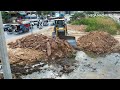 Started dozer shantui dh17c2 working operating dump truck delivery rock stone