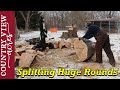 Splitting Huge rounds of wood.  Some are too big to handle.
