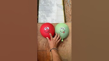 Experiment: Dropping colorful emoji water balloons from a height