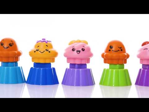 Развивающая игрушка-сортер "Веселые капкейки" от Tomy
