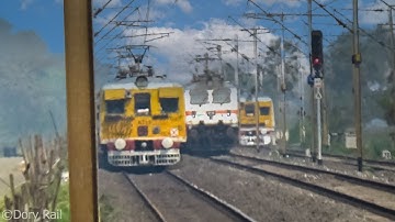 Two EMU local train and Howrah Rajdhani crossing and parallel run Indian Railways