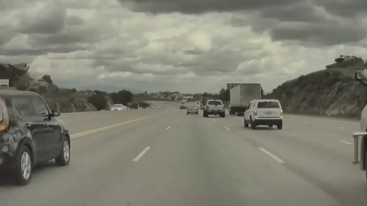 Tesla Autopilot avoids rolling wheel detached from a truck on  highway