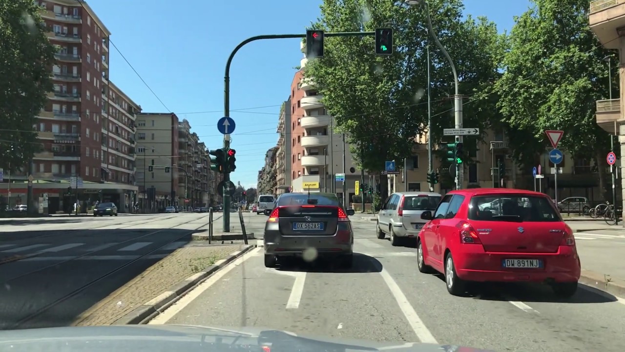Driving from piazza Derna to piazza Carducci in Turin, Italy.